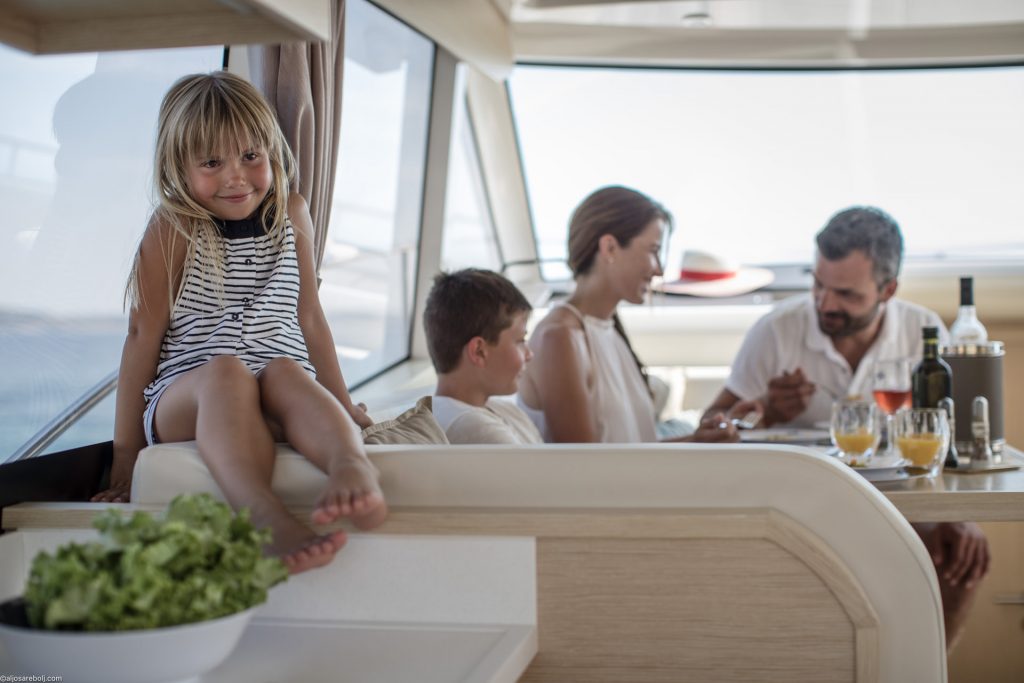 Family sharing a meal in the Greenline 39 saloon