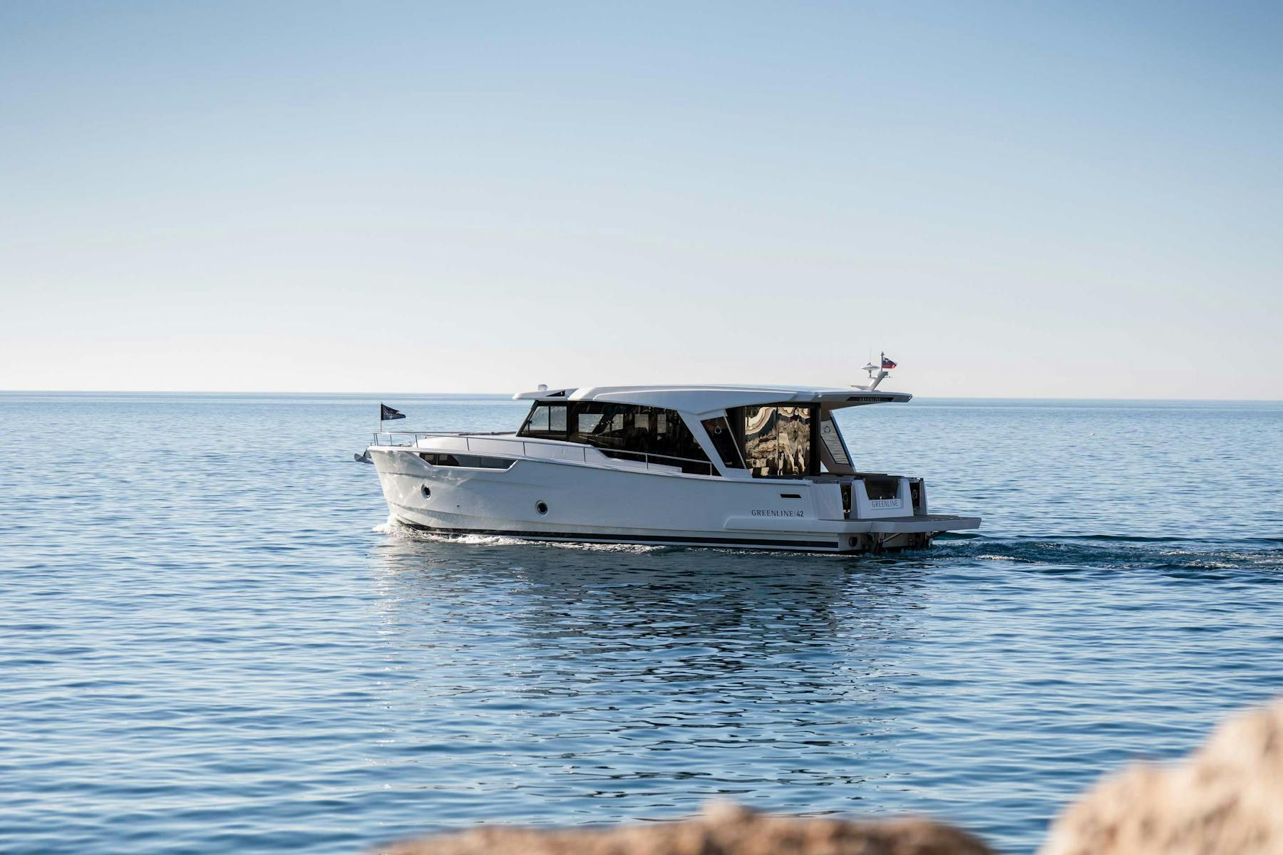 Greenline 42 side profile on calm open water