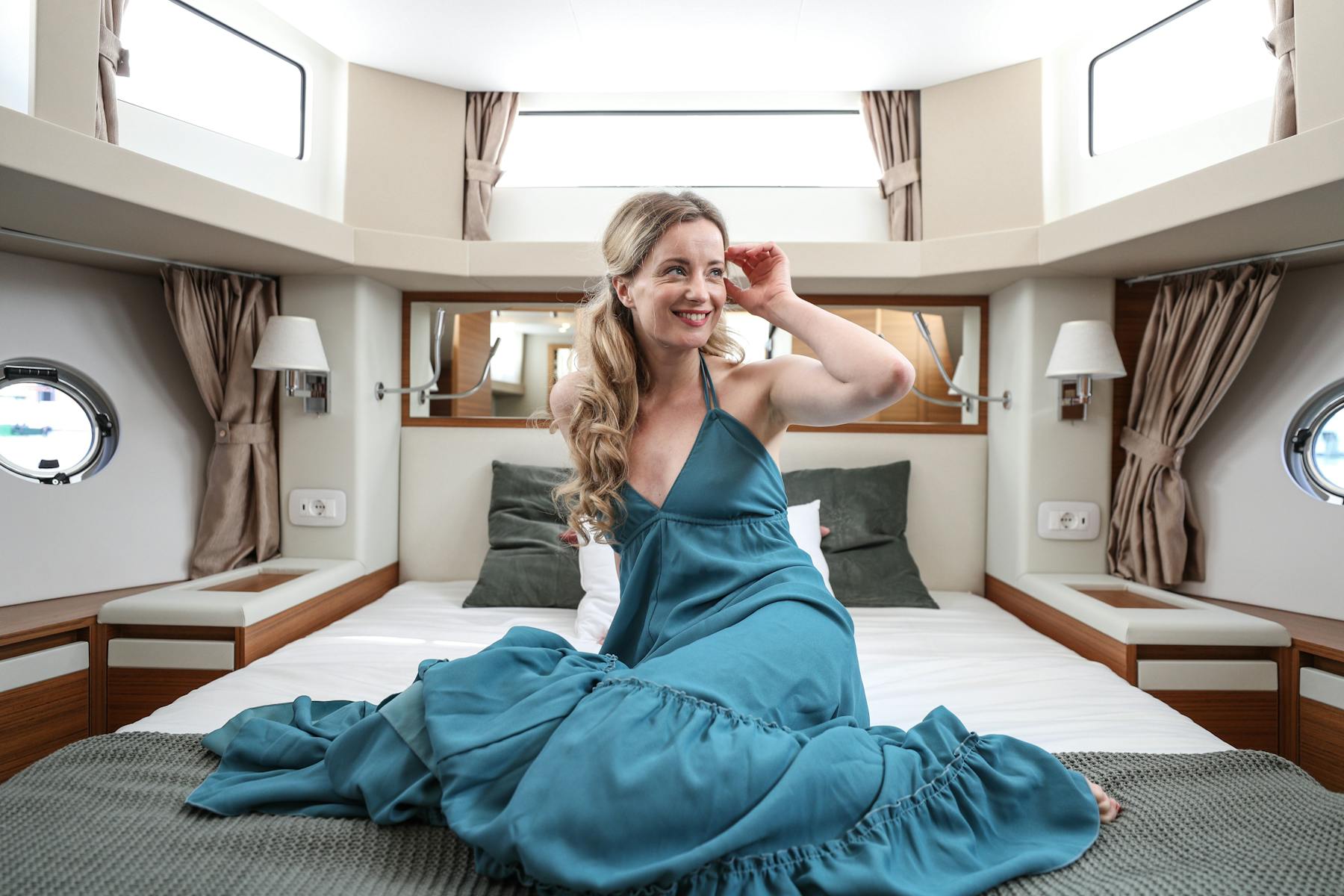 Woman relaxing in a Greenline 45 Fly cabin